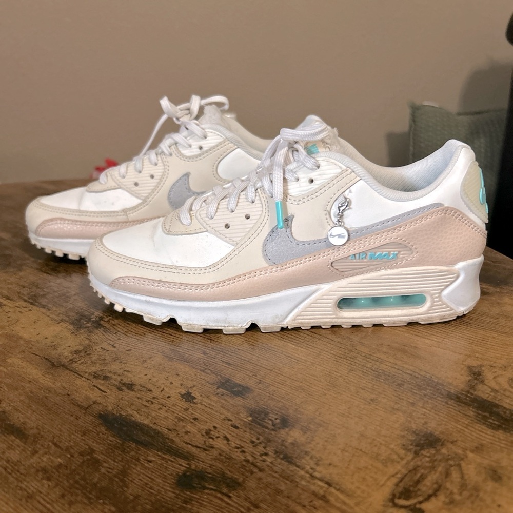 Nike air max 90s

Cream and teal color 
Light creasing on toe area